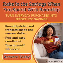 Woman online shopping on phone with debit card